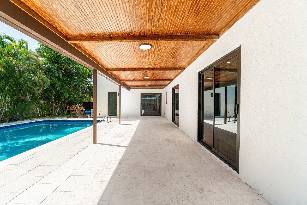 4408 Nicole Circle Tequesta, FL 33469 - Photo 24 of 29 a view of a porch