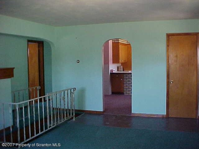 11 Rt 11 Hallstead, PA 18822 - Photo 2 of 7 a view of a hallway with wooden floor and windows