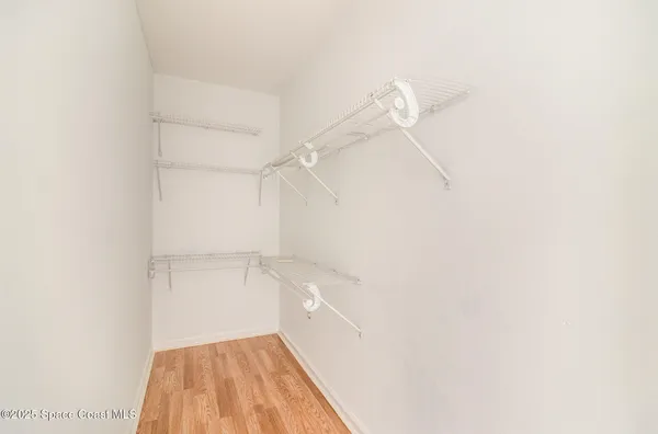 a bathroom with a sink a toilet and shower curtain
