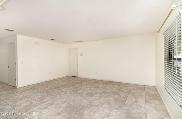 an empty room with a natural light