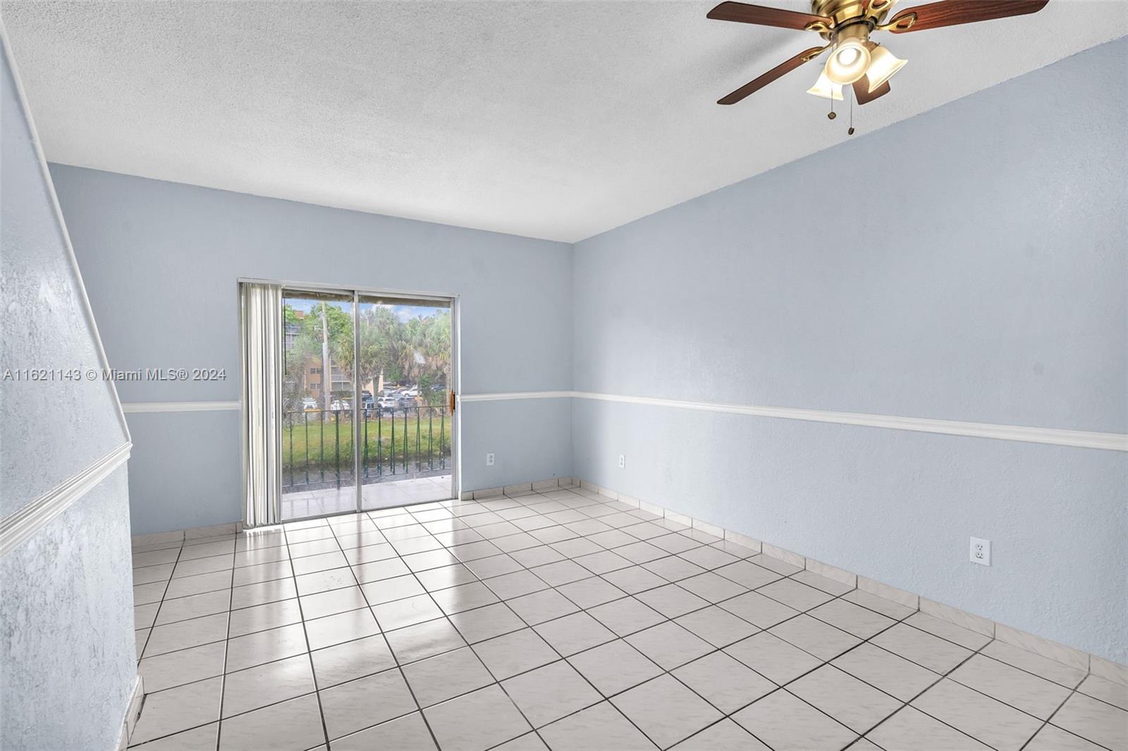 1350 West 53rd Street, Unit 12 Hialeah, FL 33012 - Photo 4 of 32 Living & Dining area