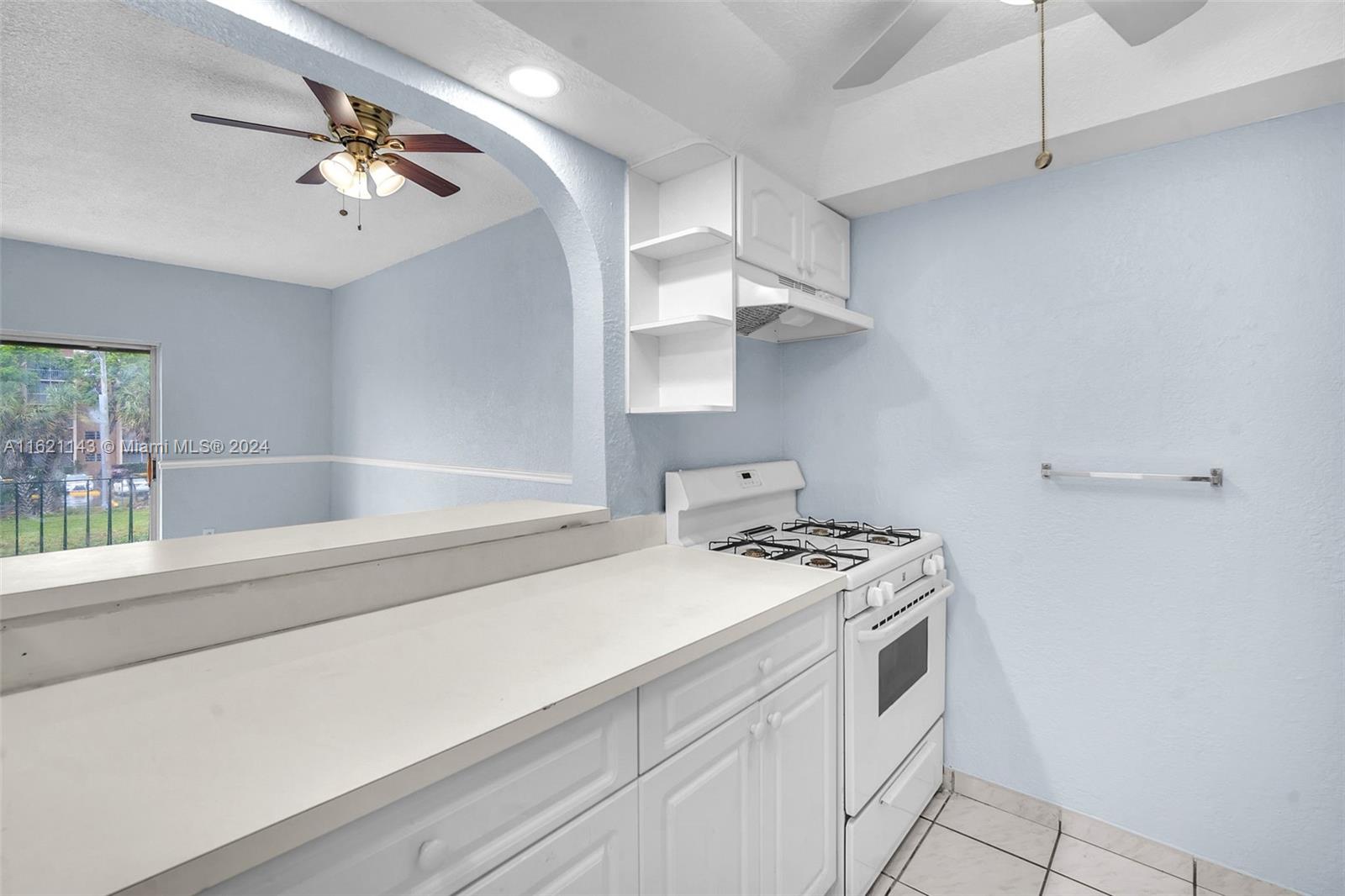 1350 West 53rd Street, Unit 12 Hialeah, FL 33012 - Photo 9 of 32 Powder room - first floor
