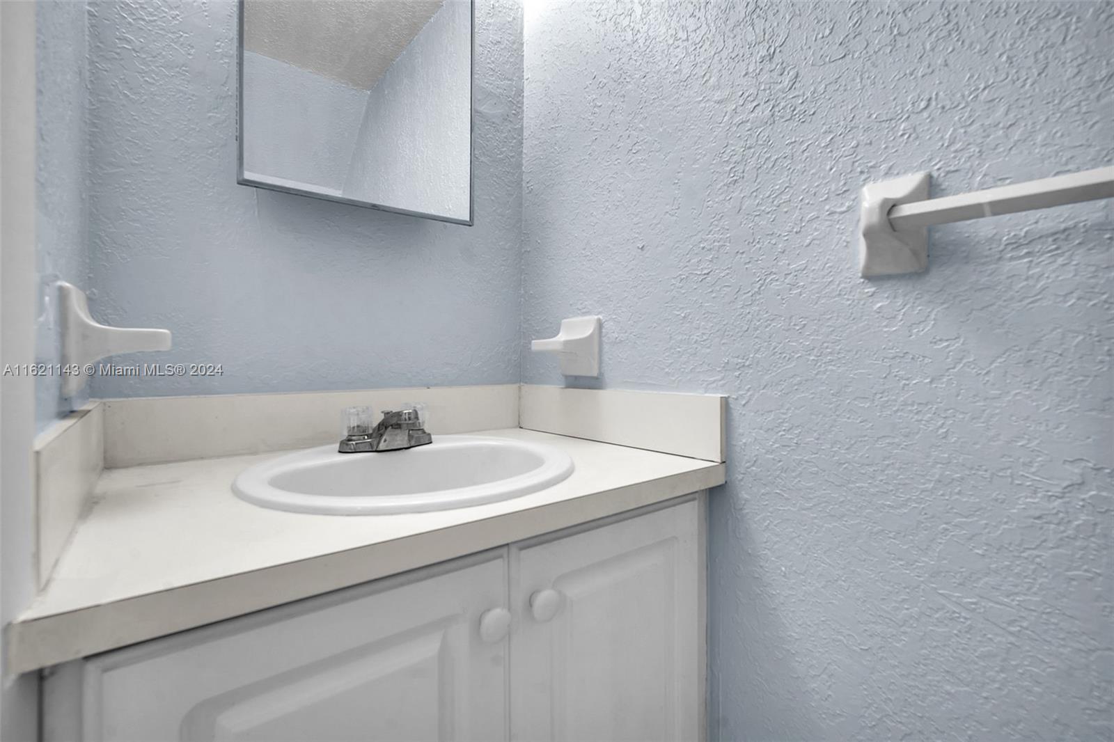 1350 West 53rd Street, Unit 12 Hialeah, FL 33012 - Photo 10 of 32 Powder room - first floor