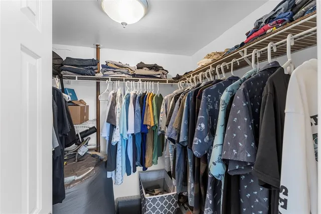 a bathroom with a tub and shower