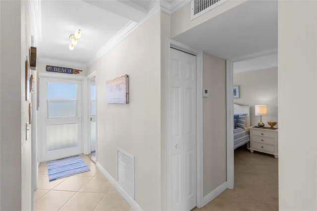 a bedroom with a bed and a chair