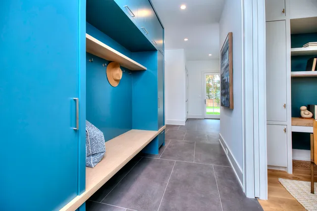 a view of a hallway with seating area