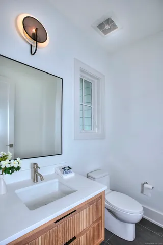 a bathroom with a sink and a toilet