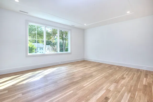 a view of an empty room and window