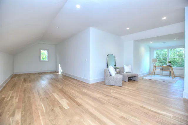 a bedroom with bed and window