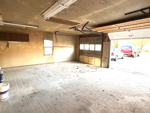 a view of a room with a wooden floor