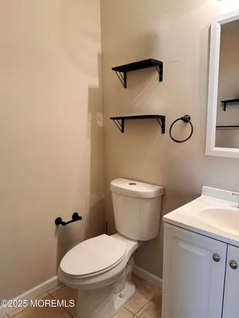 a bathroom with a toilet and a sink