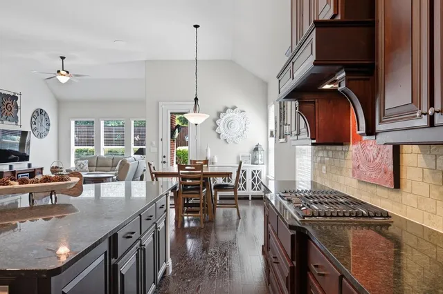 a kitchen with granite countertop lots of counter top space