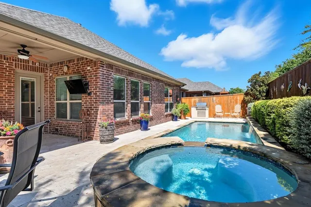 a view of a house with swimming pool