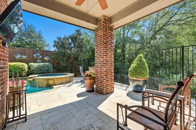 a view of a patio with couches table and chairs