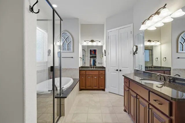 a bathroom with a sink a vanity and a mirror