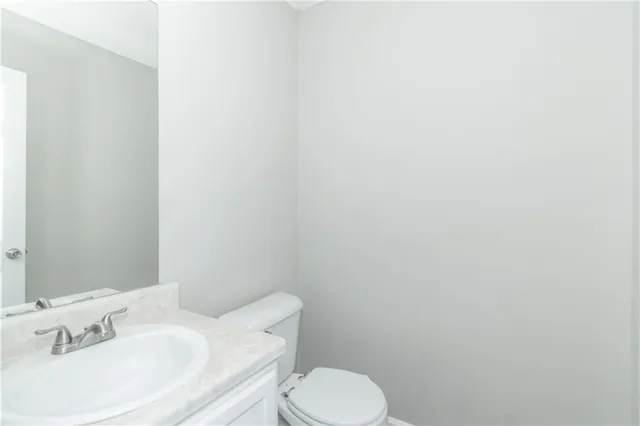 a bathroom with a sink and a toilet