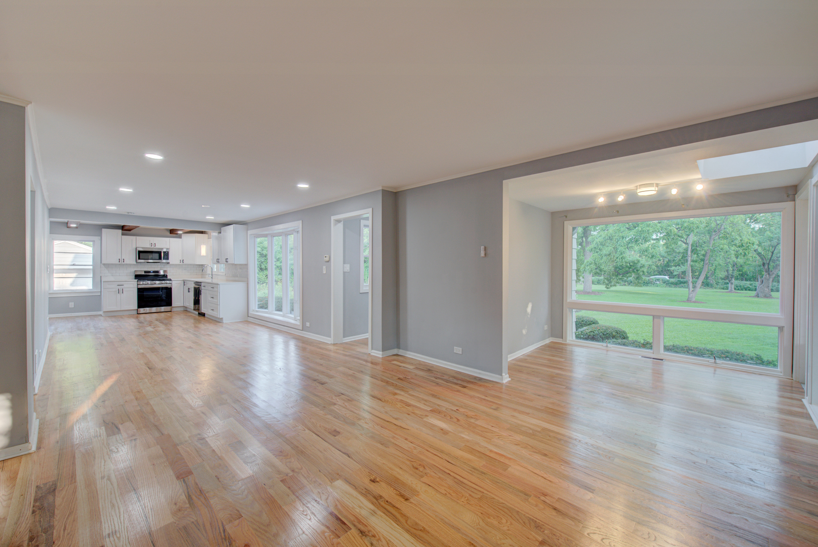 2360 Maple Road Homewood, IL 60430 - Photo 12 of 33 a view of empty room with wooden floor and window