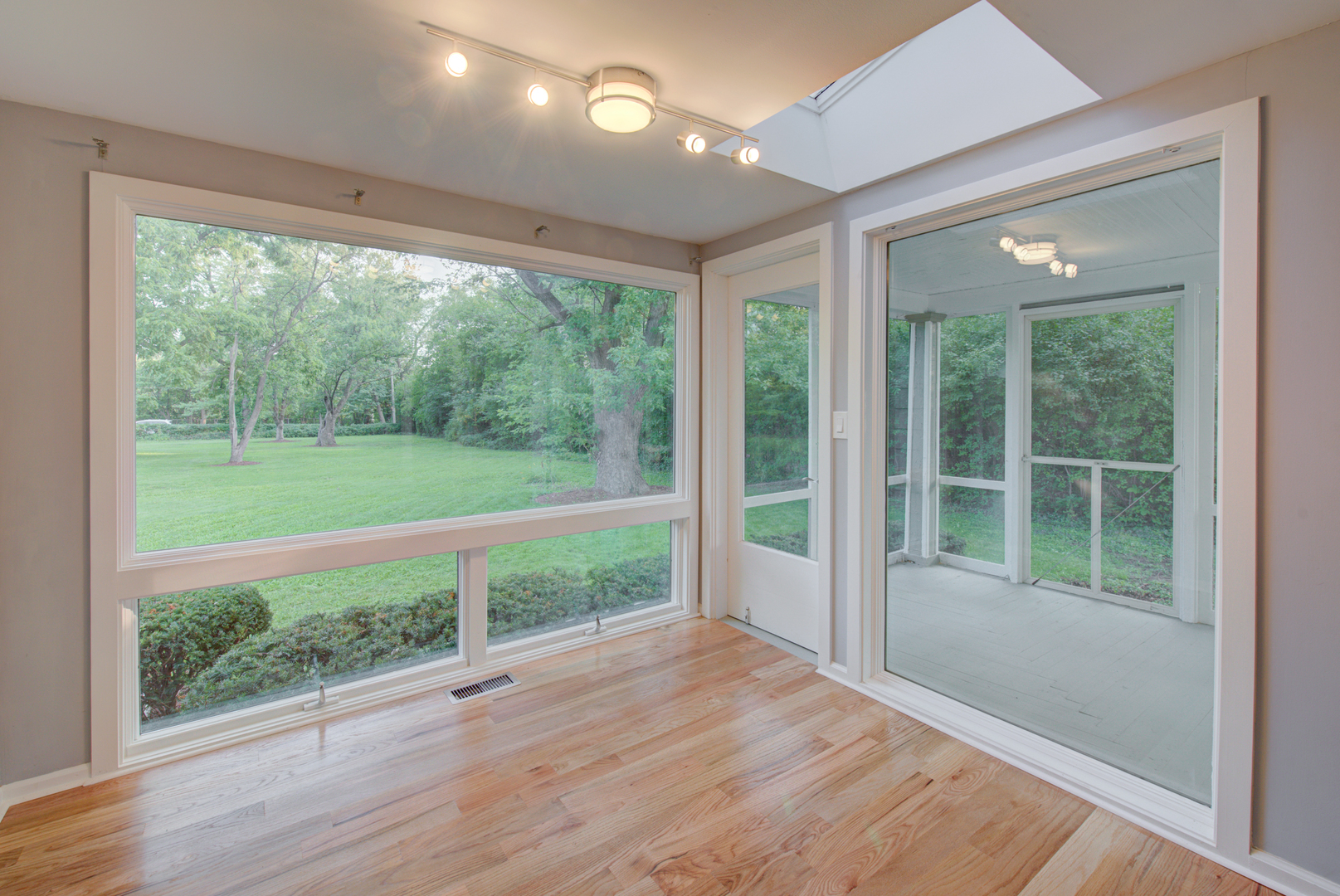 2360 Maple Road Homewood, IL 60430 - Photo 4 of 33 a view of outdoor space with wooden floor and outdoor view