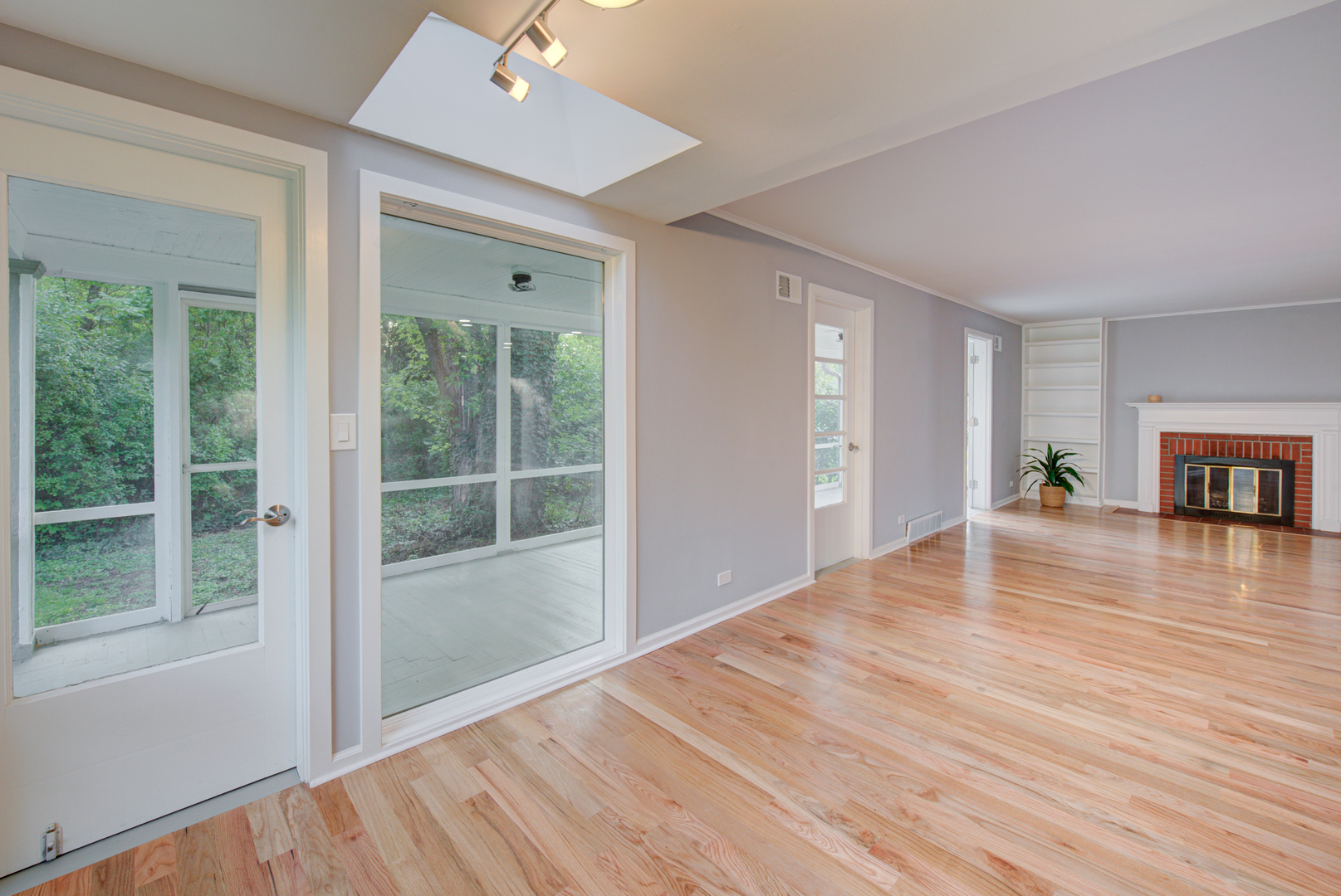 2360 Maple Road Homewood, IL 60430 - Photo 9 of 33 a view of empty room with wooden floor and fan