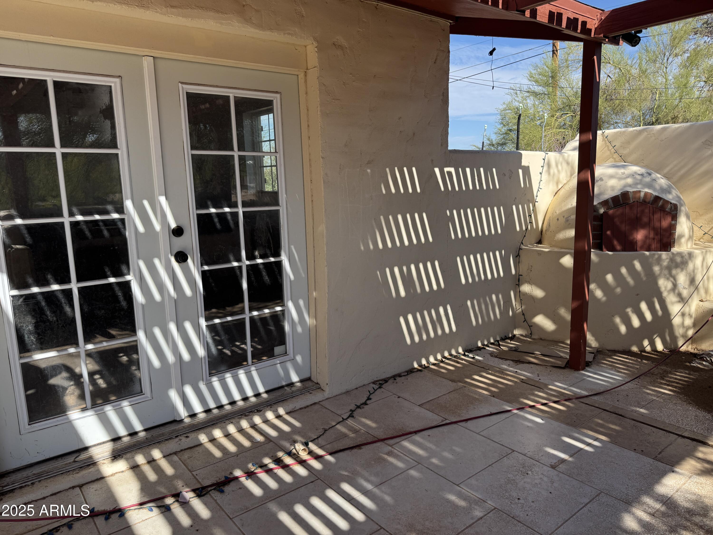 851 East Junction Street Apache Junction, AZ 85119 - Photo 5 of 13 a view of a building with a door and a window