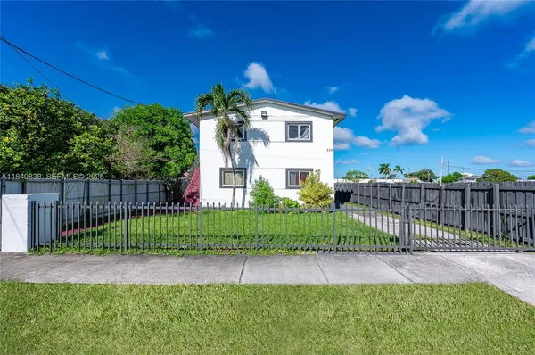 a front view of a house having yard