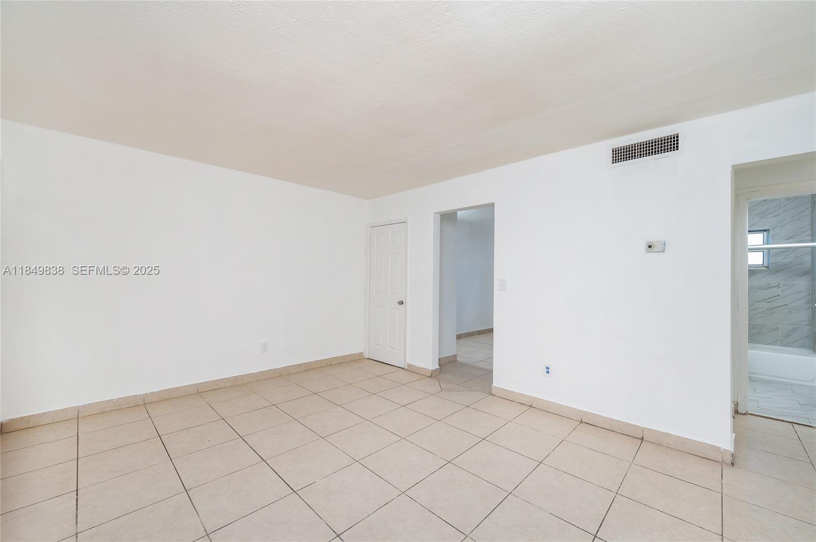 520 Southwest Krome Terrace, Unit 1 Homestead, FL 33030 - Photo 12 of 27 a view of an empty room