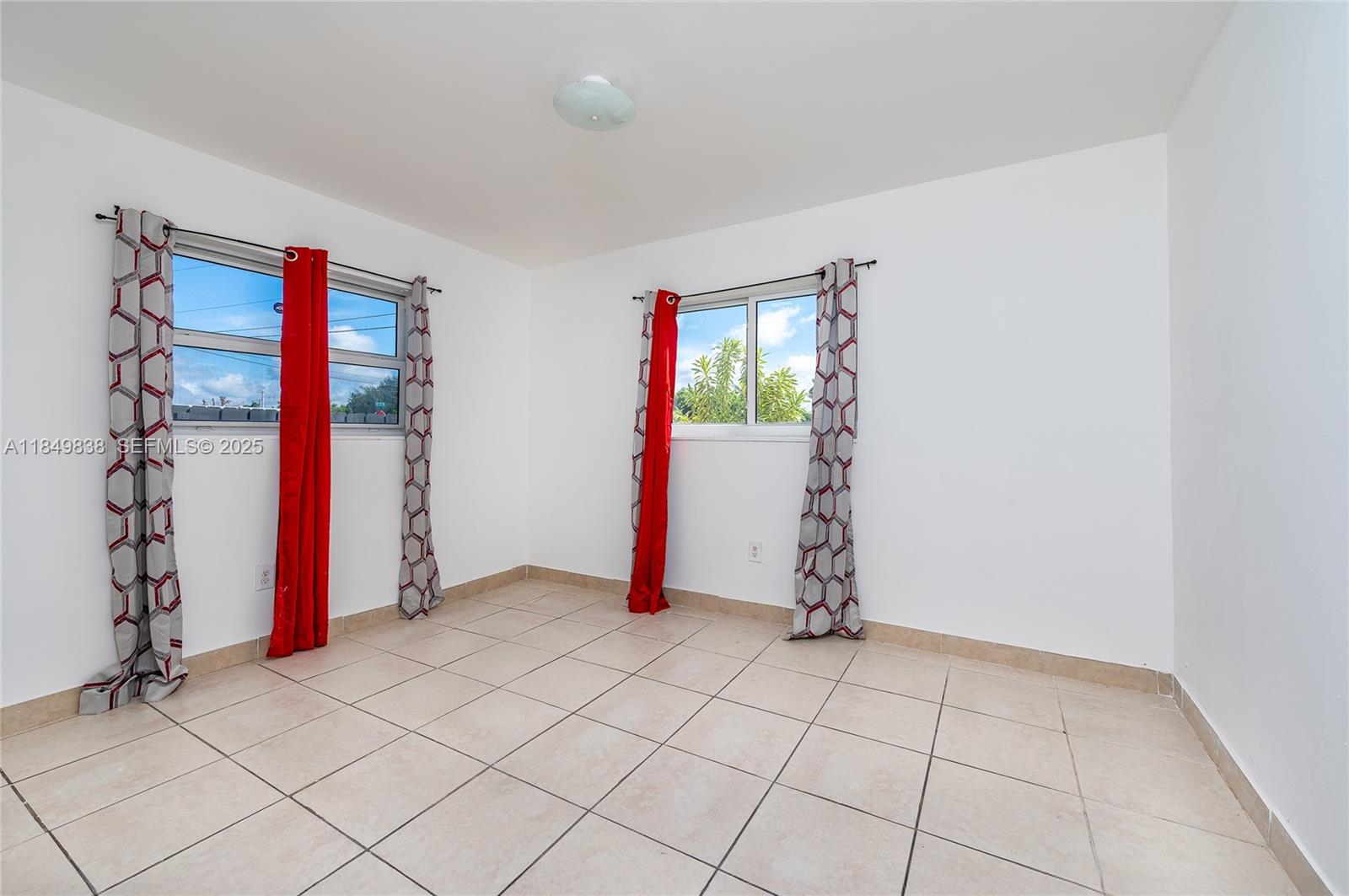 520 Southwest Krome Terrace, Unit 1 Homestead, FL 33030 - Photo 13 of 27 a view of an entryway with window
