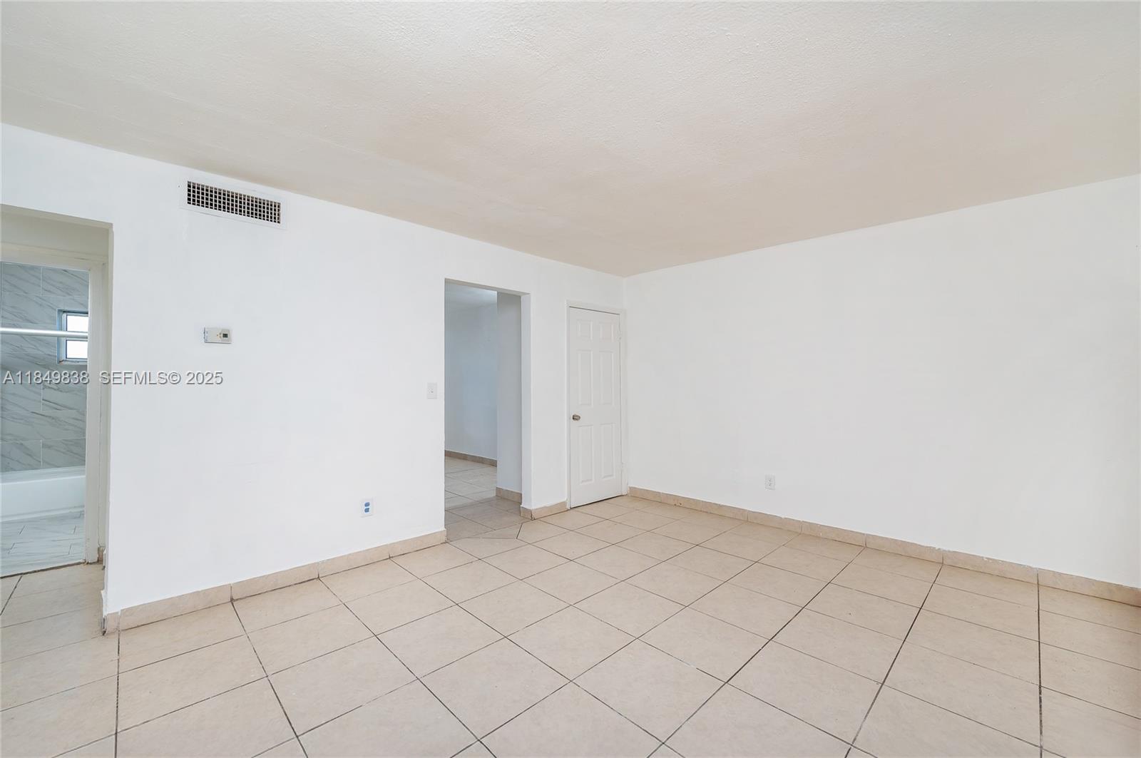 520 Southwest Krome Terrace, Unit 1 Homestead, FL 33030 - Photo 15 of 27 a view of an empty room
