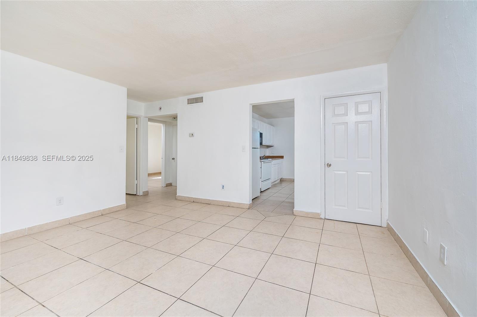 520 Southwest Krome Terrace, Unit 1 Homestead, FL 33030 - Photo 20 of 27 a view of an empty room and entryway