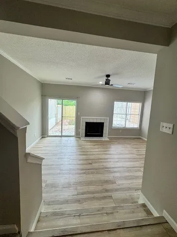 a view of an empty room and window