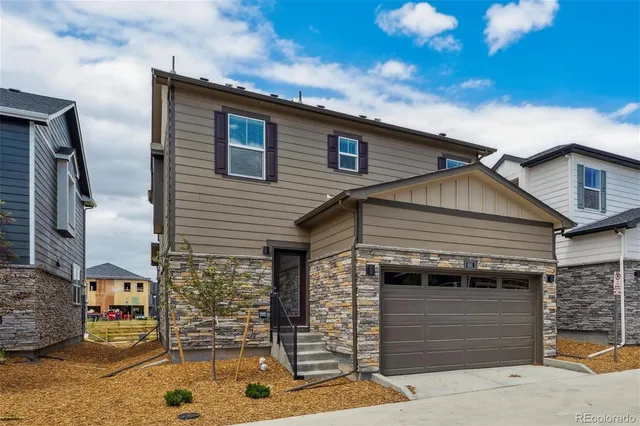 a view of a house with a garage