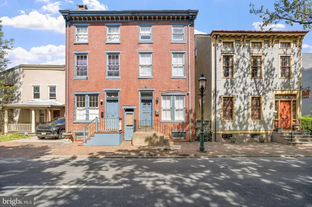 a front view of a building with street view