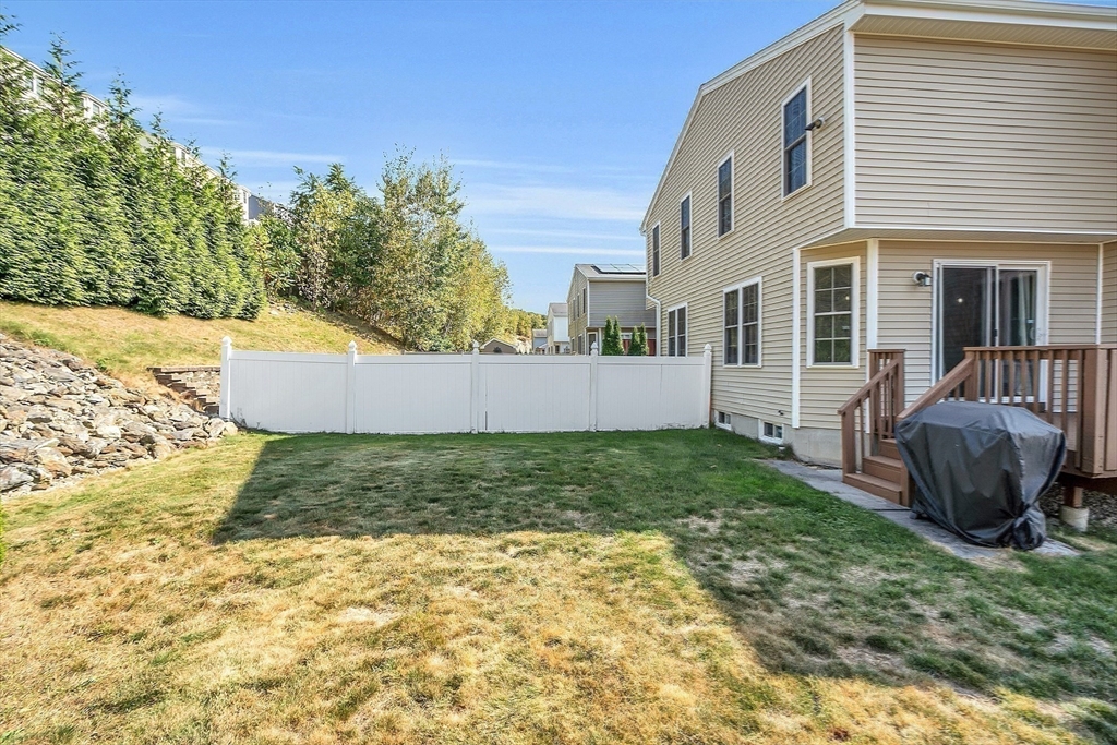 56 Honeysuckle Road Worcester, MA 01607 - Photo 24 of 27 a view of back yard of the house