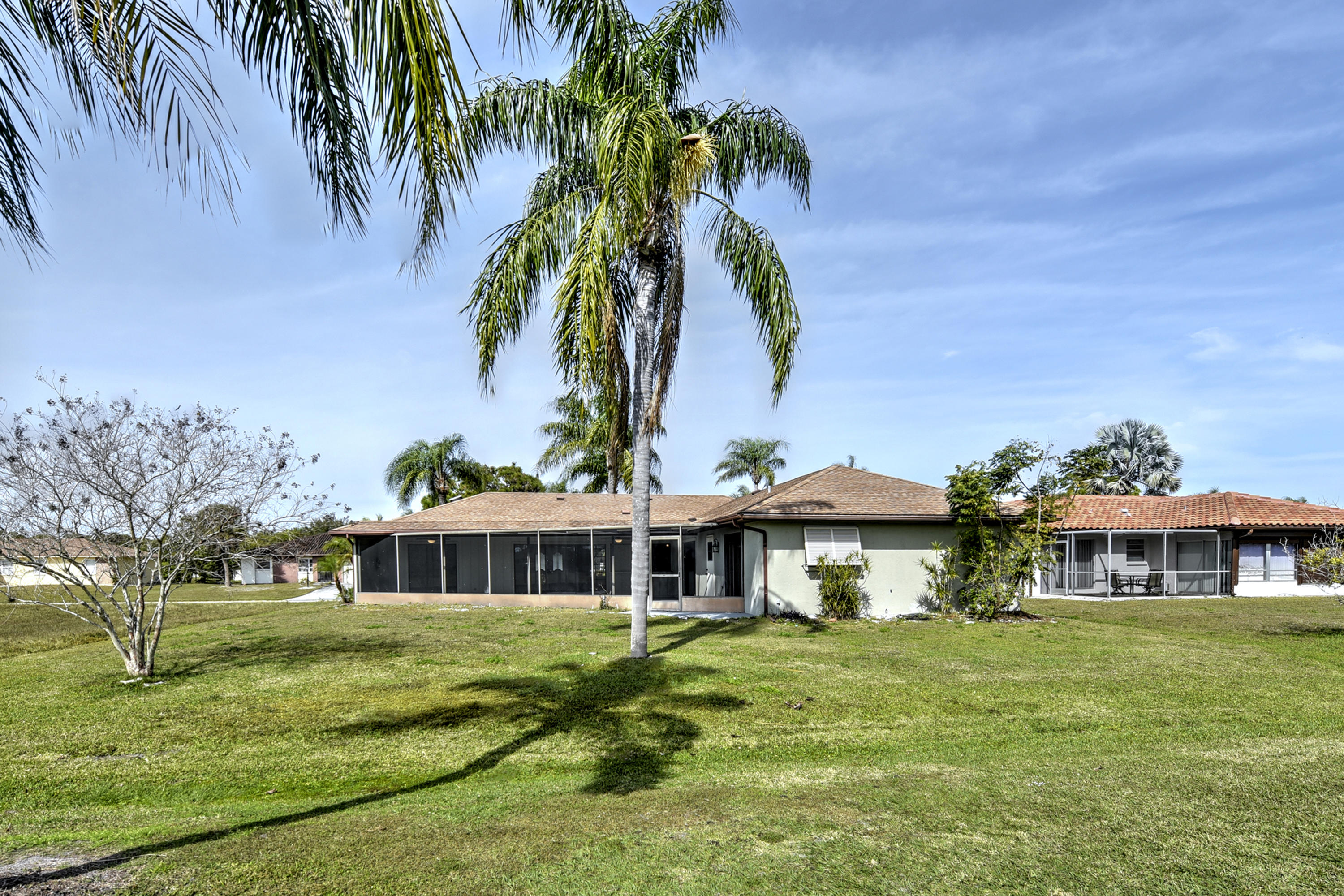 198 Caddy Road Rotonda West, FL 33947 - Photo 23 of 25 23 Exterior Back View