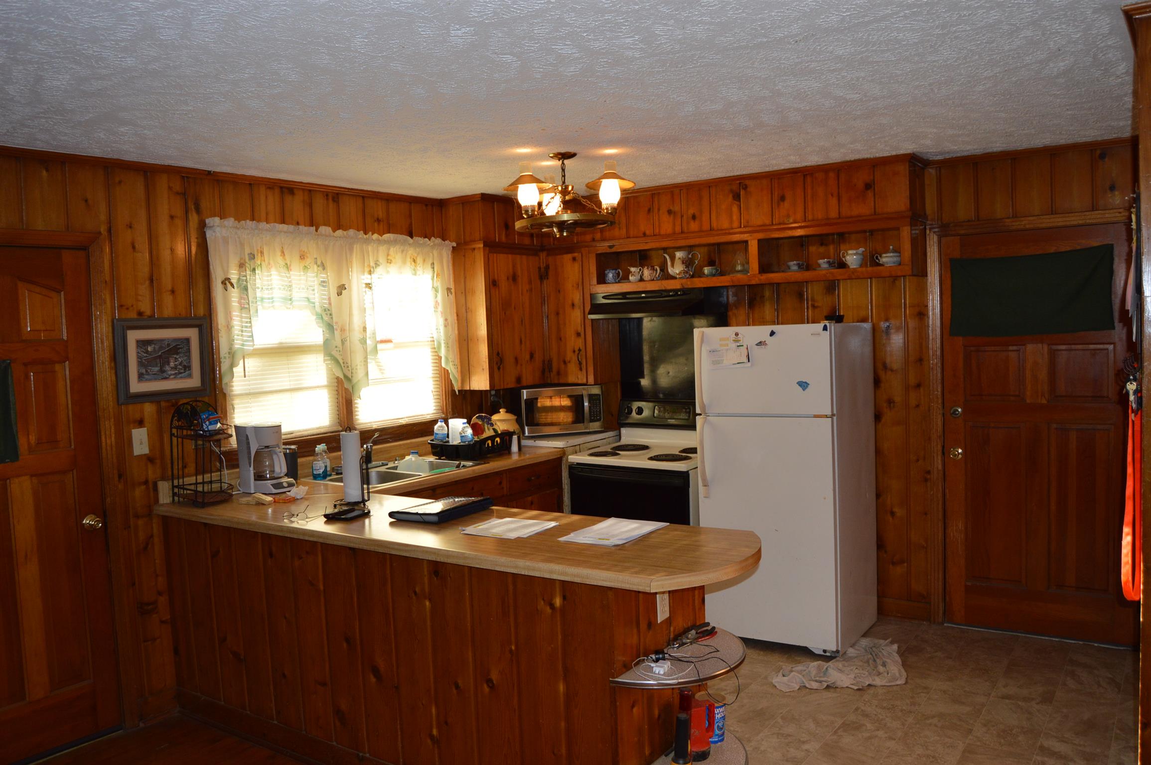 910 Halls Mill Road Unionville, TN 37180 - Photo 8 of 17 Kitchen area. Stove and refrigerator remain with the property.