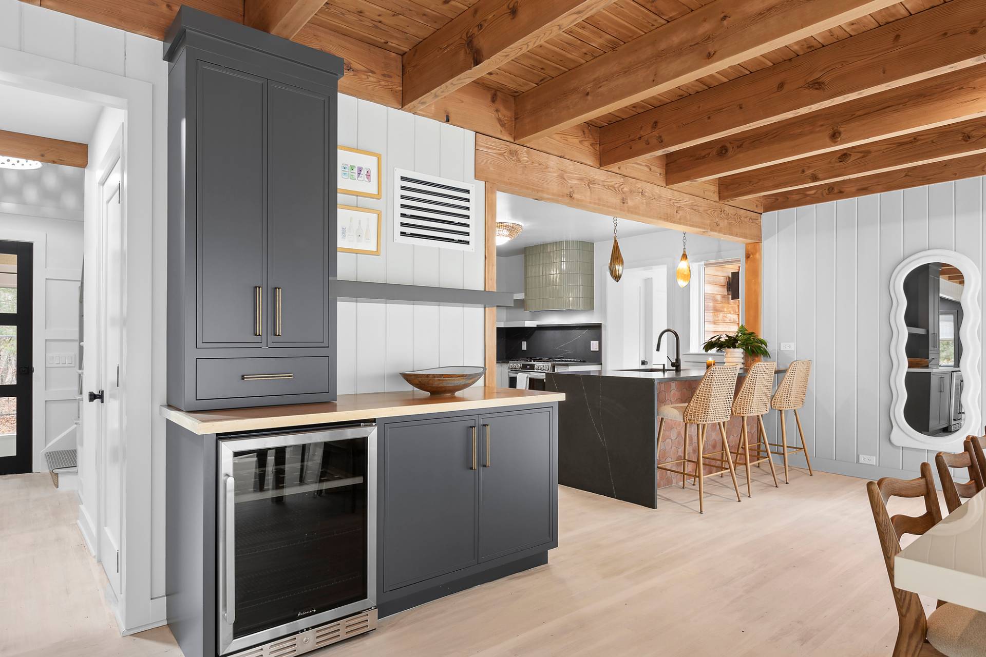5 Phoebe Scoys Road East Hampton, NY 11937 - Photo 14 of 43 a kitchen with table chairs and refrigerator