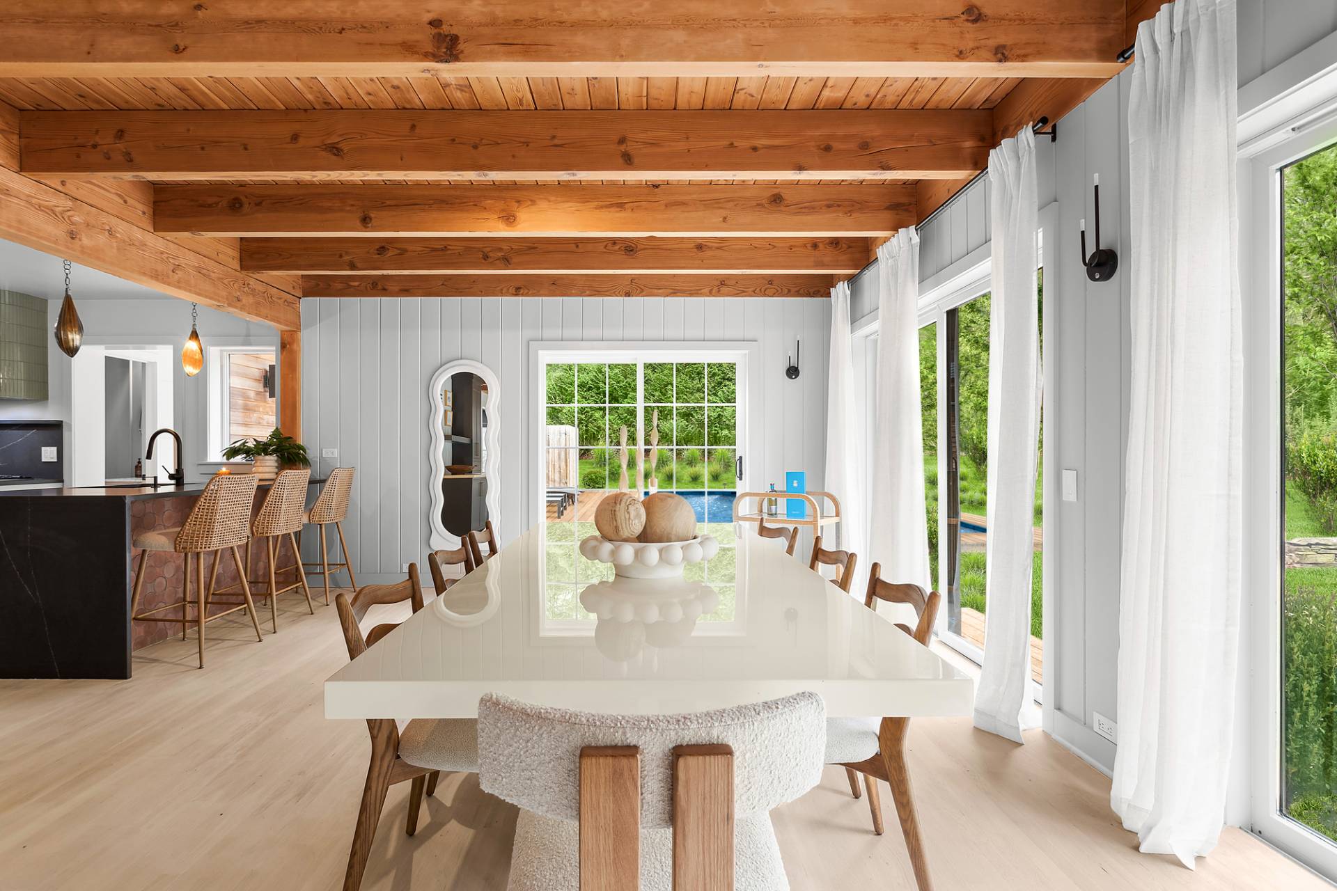 5 Phoebe Scoys Road East Hampton, NY 11937 - Photo 17 of 43 a view of a dining room with furniture window and outside view