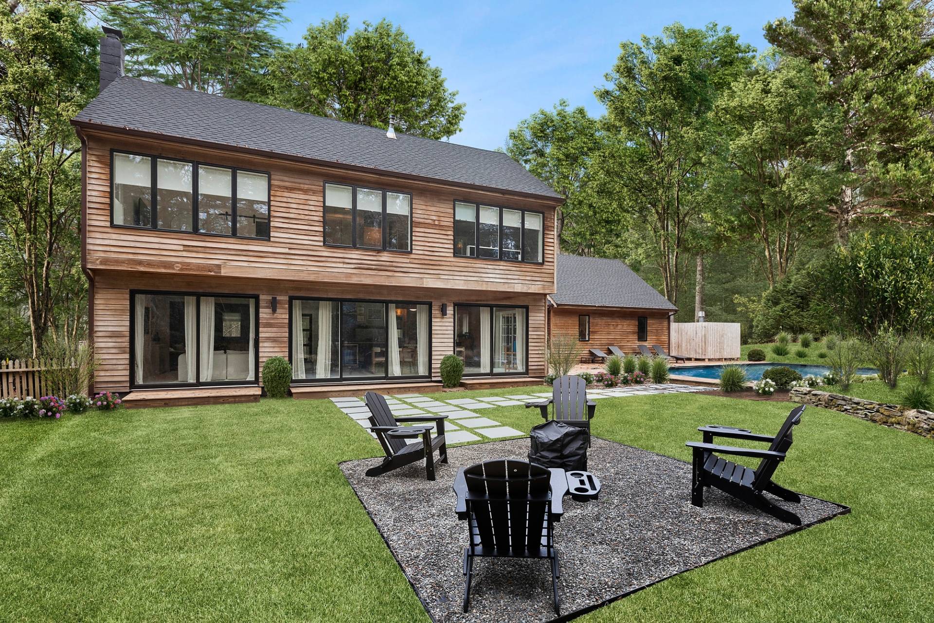 5 Phoebe Scoys Road East Hampton, NY 11937 - Photo 2 of 43 a view of a house with a yard and sitting area