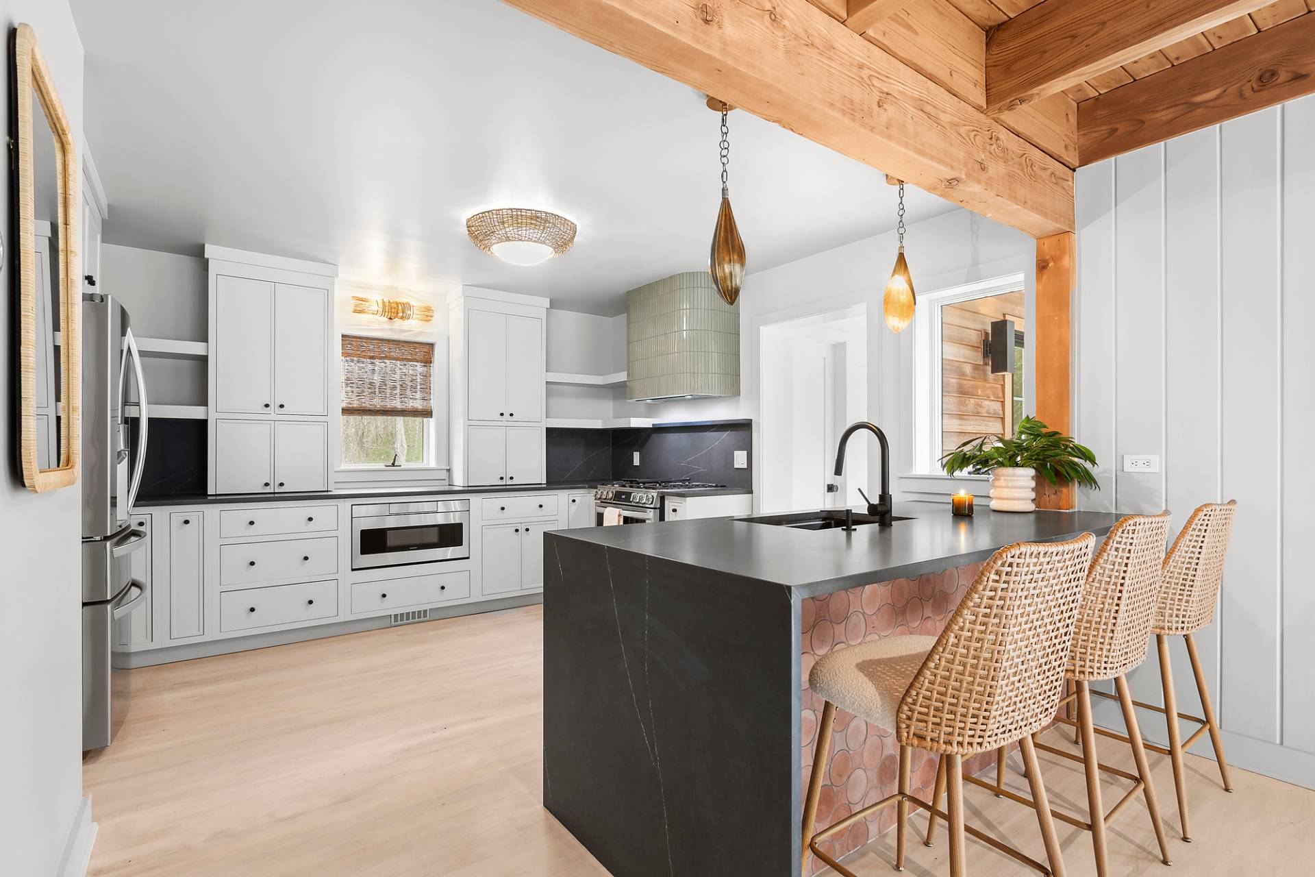 5 Phoebe Scoys Road East Hampton, NY 11937 - Photo 21 of 43 a kitchen with stainless steel appliances kitchen island granite countertop a stove a sink and a refrigerator