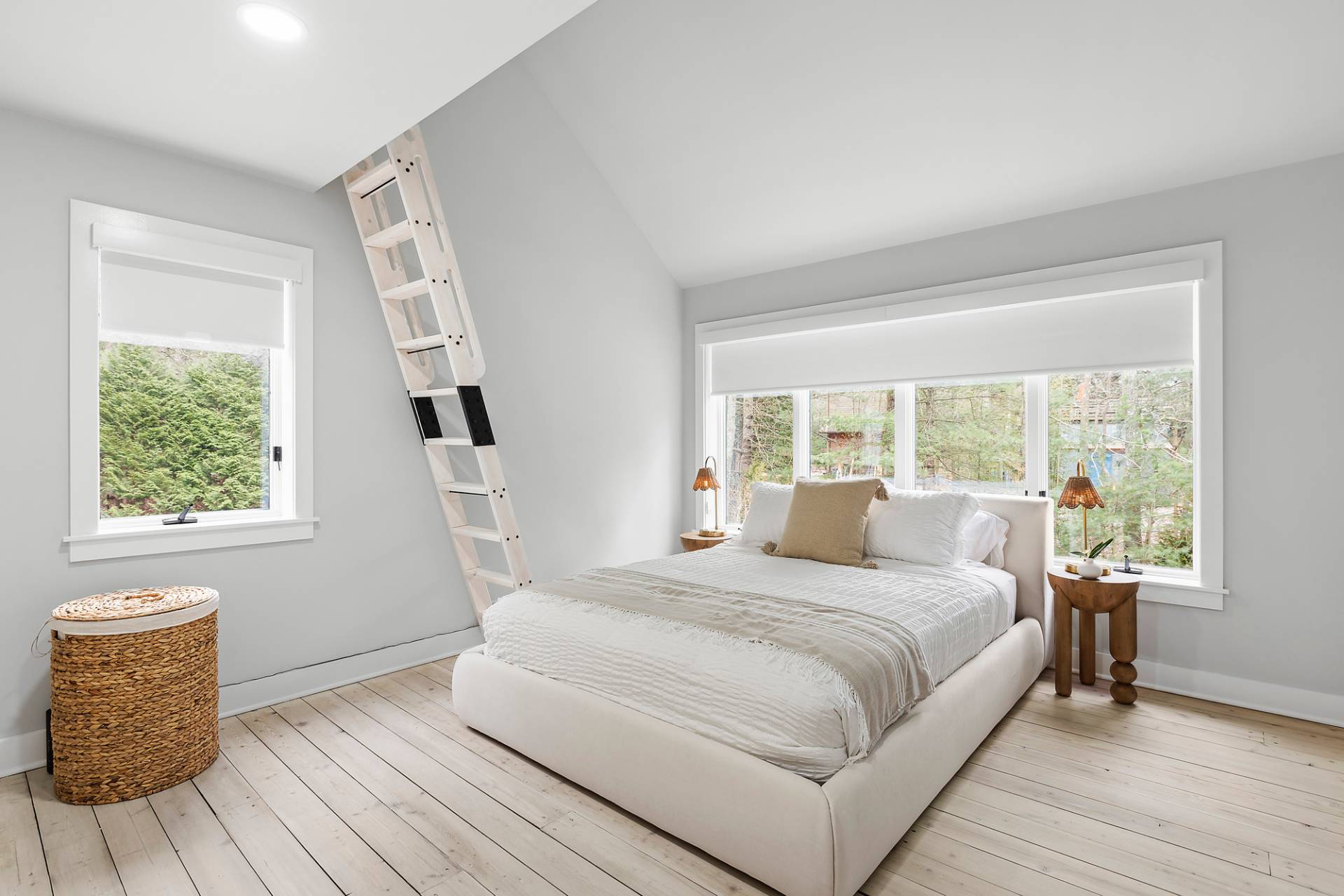 5 Phoebe Scoys Road East Hampton, NY 11937 - Photo 36 of 43 a bedroom with a bed and wooden floor