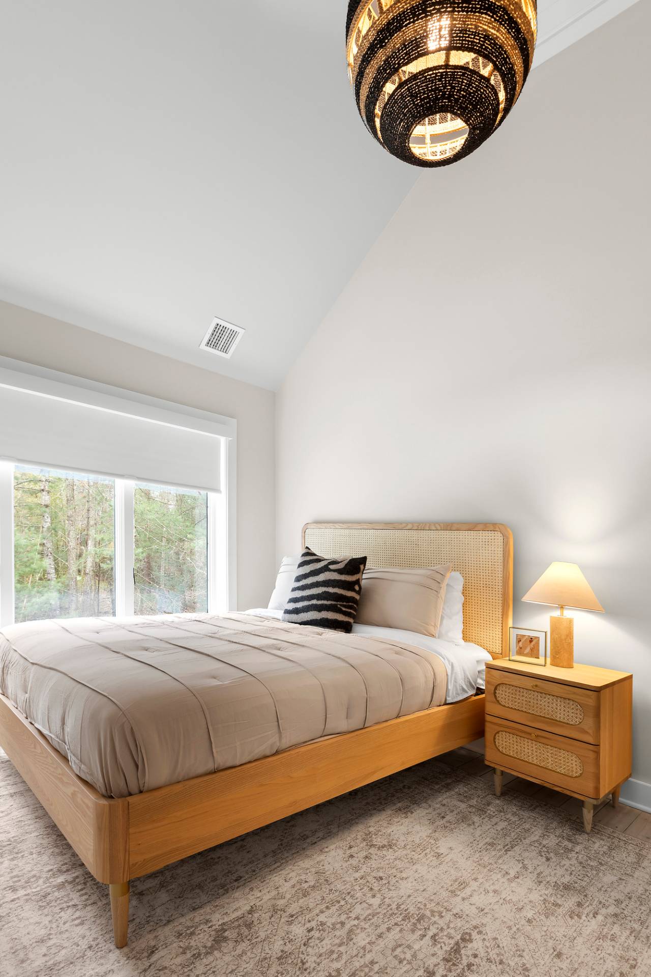 5 Phoebe Scoys Road East Hampton, NY 11937 - Photo 38 of 43 a bedroom with a bed and a chair