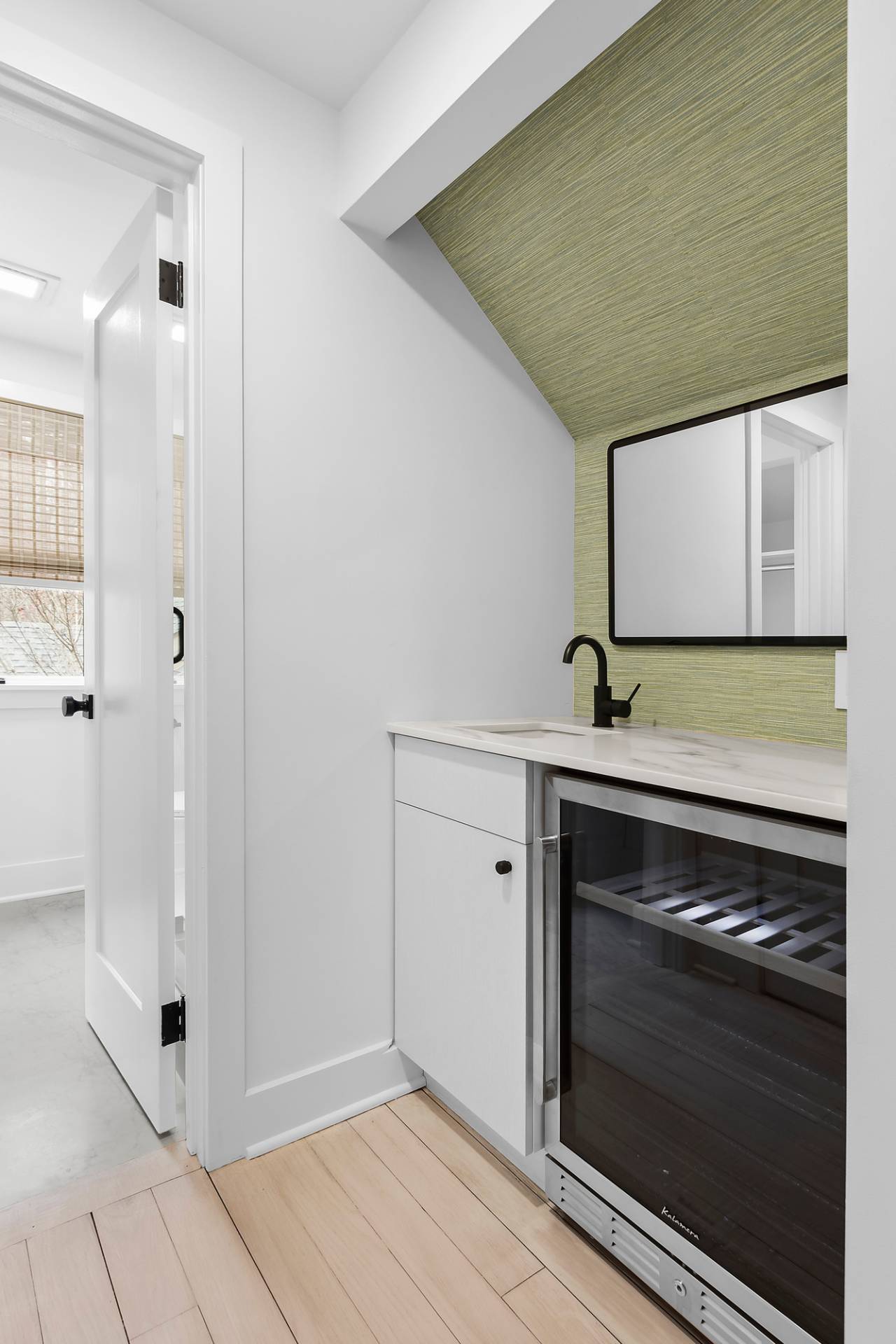 5 Phoebe Scoys Road East Hampton, NY 11937 - Photo 41 of 43 a bathroom with a sink and a mirror