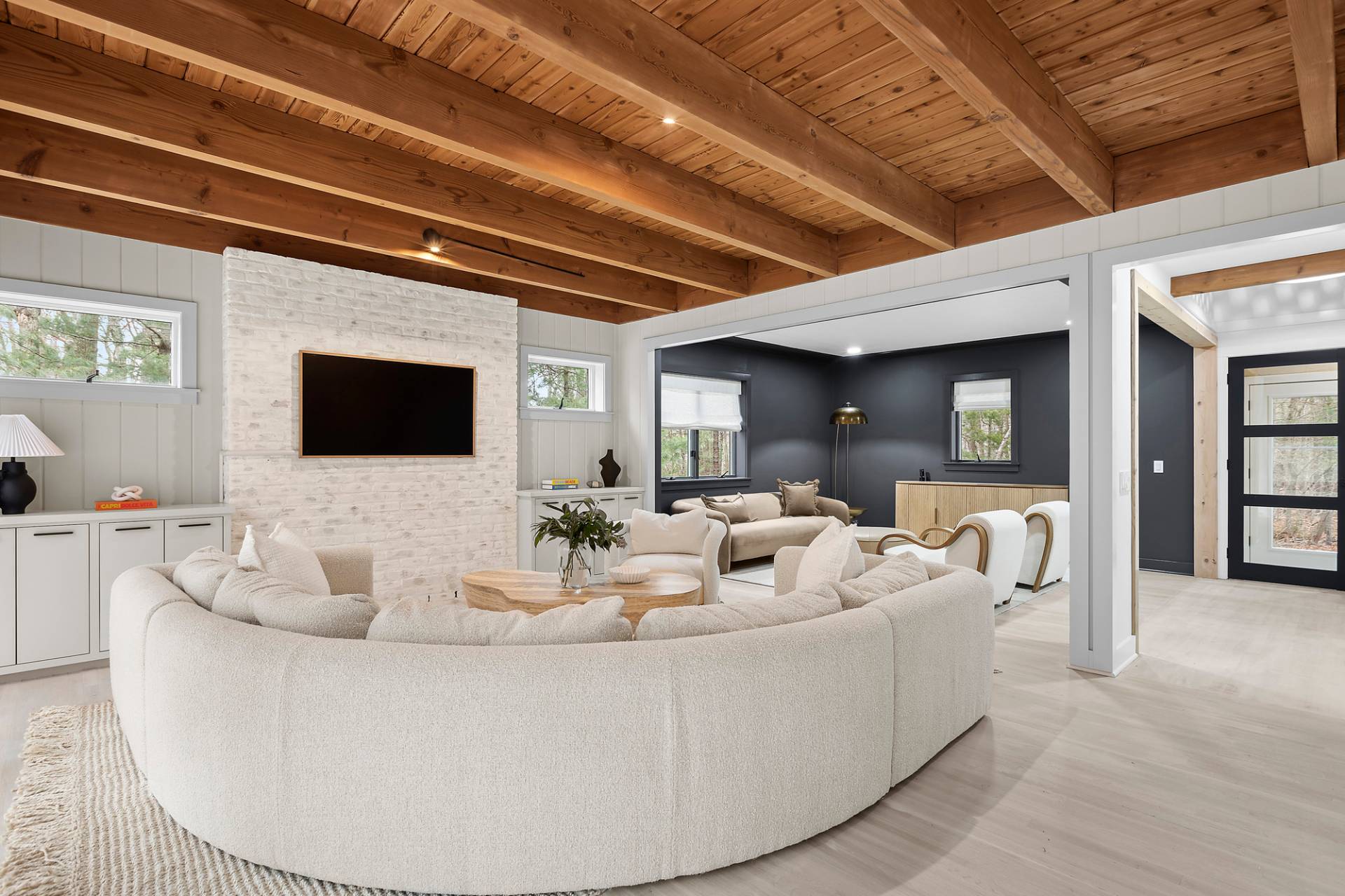 5 Phoebe Scoys Road East Hampton, NY 11937 - Photo 8 of 43 a living room with furniture and a flat screen tv