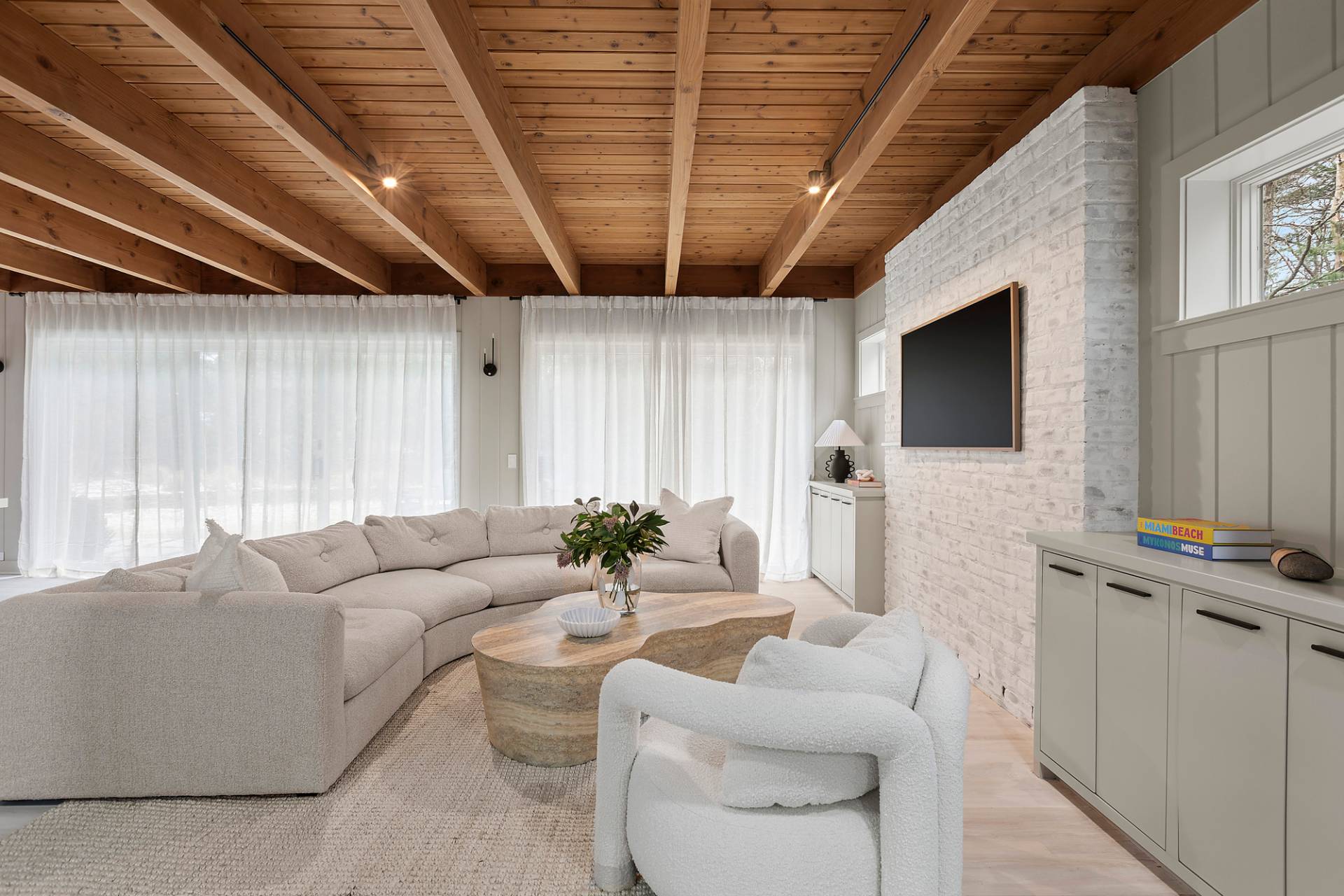 5 Phoebe Scoys Road East Hampton, NY 11937 - Photo 9 of 43 a living room with furniture and a flat screen tv