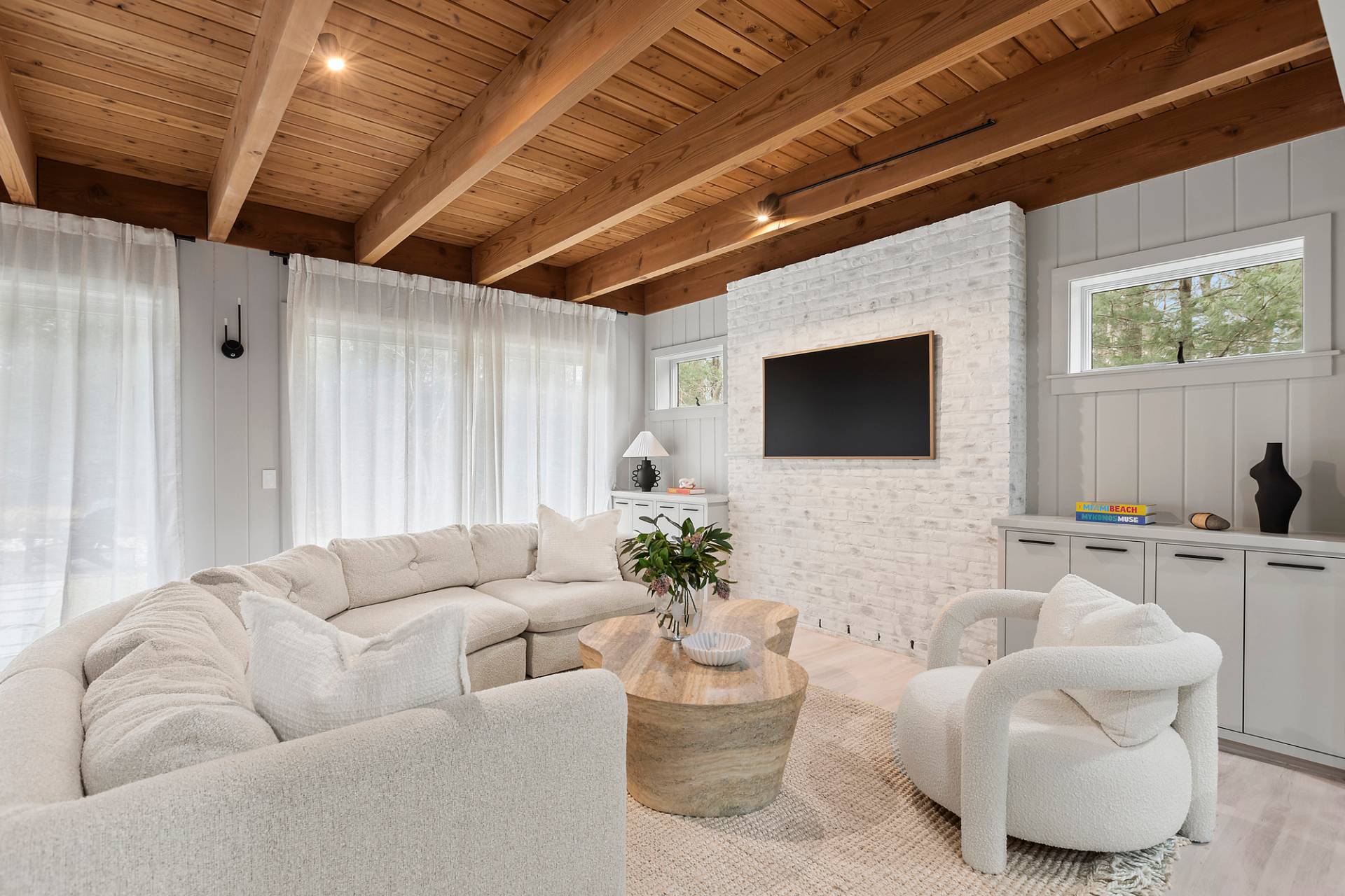 5 Phoebe Scoys Road East Hampton, NY 11937 - Photo 10 of 43 a living room with furniture and a flat screen tv