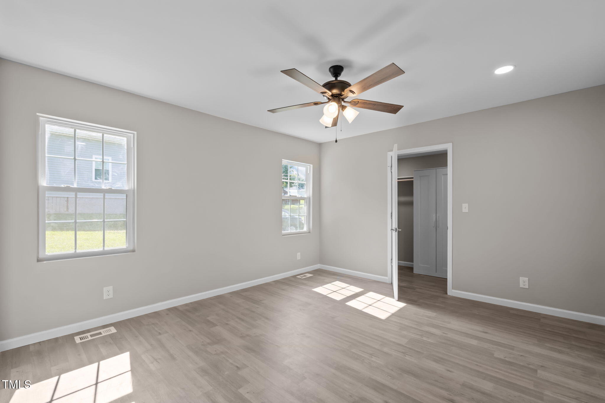 150 Summit Street Roxboro, NC 27573 - Photo 22 of 37 wooden floor in an empty room with a window