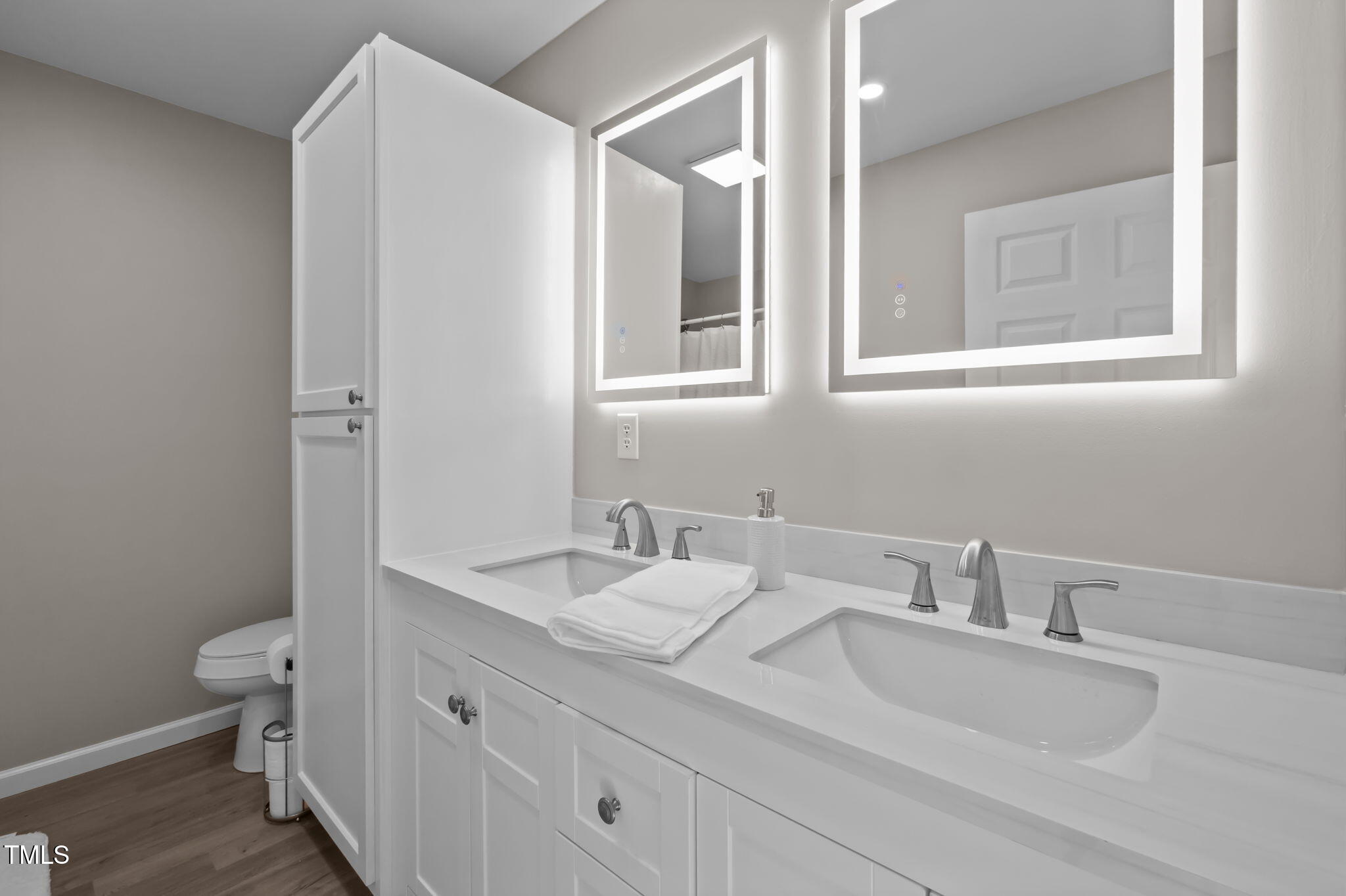 150 Summit Street Roxboro, NC 27573 - Photo 25 of 37 a bathroom with a granite countertop toilet sink and mirror
