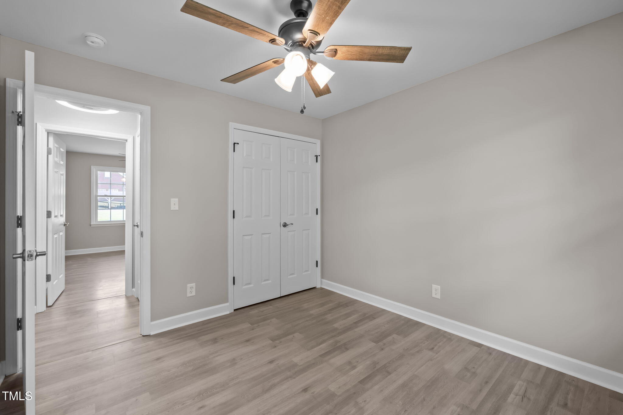 150 Summit Street Roxboro, NC 27573 - Photo 30 of 37 wooden floor in an empty room with a window