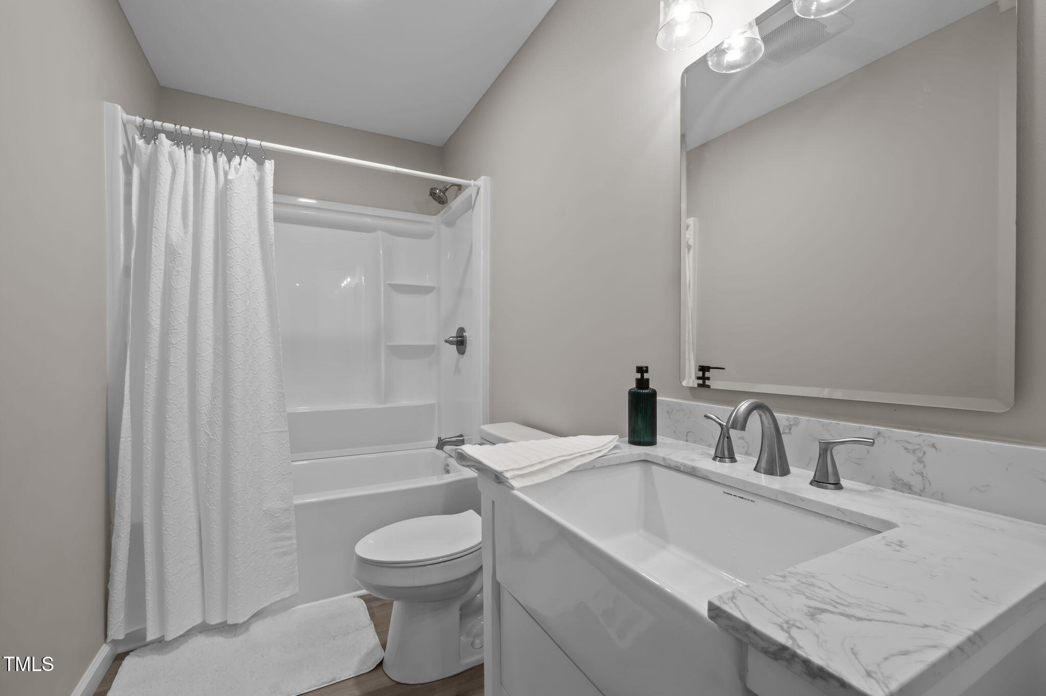 150 Summit Street Roxboro, NC 27573 - Photo 32 of 37 a bathroom with a sink toilet and shower