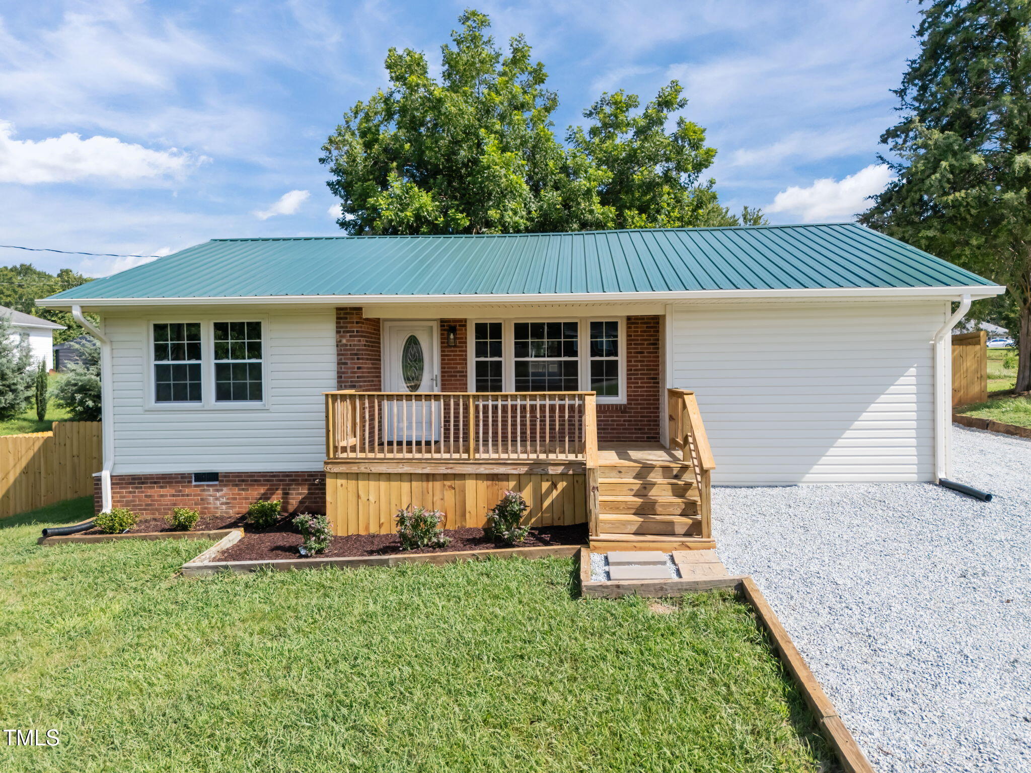 150 Summit Street Roxboro, NC 27573 - Photo 5 of 37 a view of a house with a yard